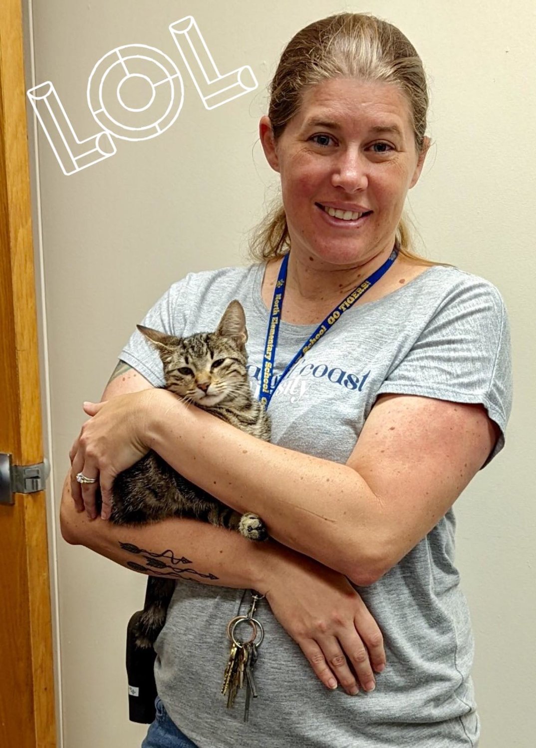 NES assistant principal Mrs. Heather Briney cares for smuggled cat until relative arrives to take her home.